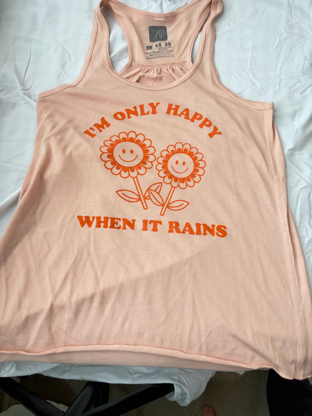 🛍️ 4 for 20🛍️ Bundle and save! 🛍️
Peach Graphic Racerback Tank Top -